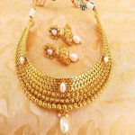 Mesmerizing White Kemp Metallic Necklace set with Jhumkas