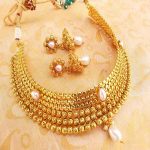 Mesmerizing White Kemp Metallic Necklace set with Jhumkas