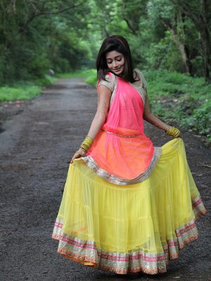 Fashionable Yellow Color Lahenga Choli In Net Fabric