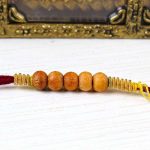 Rakhi with Zardosi work