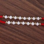 Golden and White Pearl Rakhis