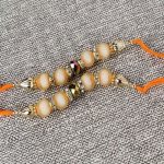 Two Crystal Shine Bead with Colorful Pearls Finest Rakhi