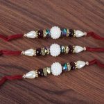 Pearl Dial with Shiny Beads Three Rakhis