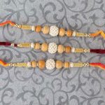 Three Pearl Rhinestone and Wooden Beads Rakhi