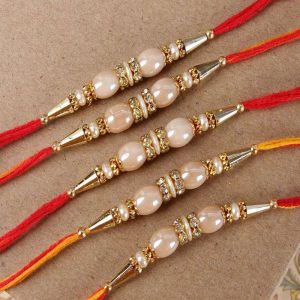 Collection of Five Ellipse Shape Pearl Rakhi