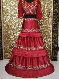 Letest Surbhi Chandna In Maroon Colored Three Layer Lehenga