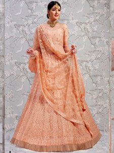 Peach Heavy Embroidered With Diamond Work Soft Net Wedding Semi Stitched Lehenga