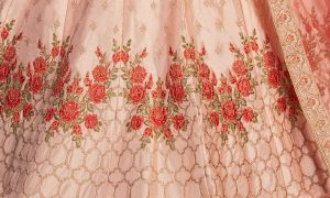 Peach Embroidered Satin Party Wear Semi Stitched Lehenga