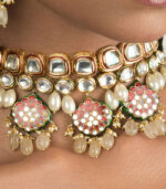 Pristine Enamelled Red And Off White Kundan Necklace And Earring Set